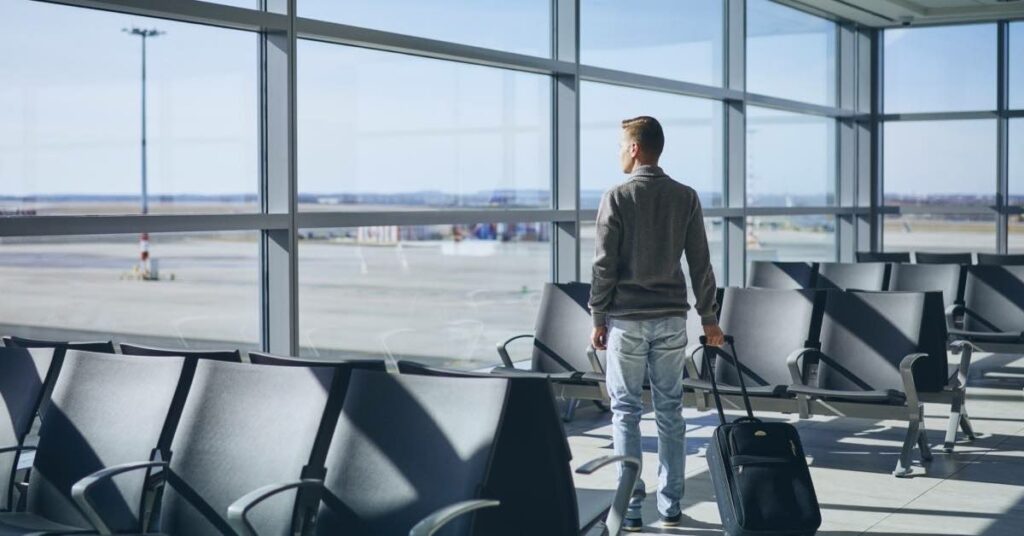 Traveller in Airport Terminal